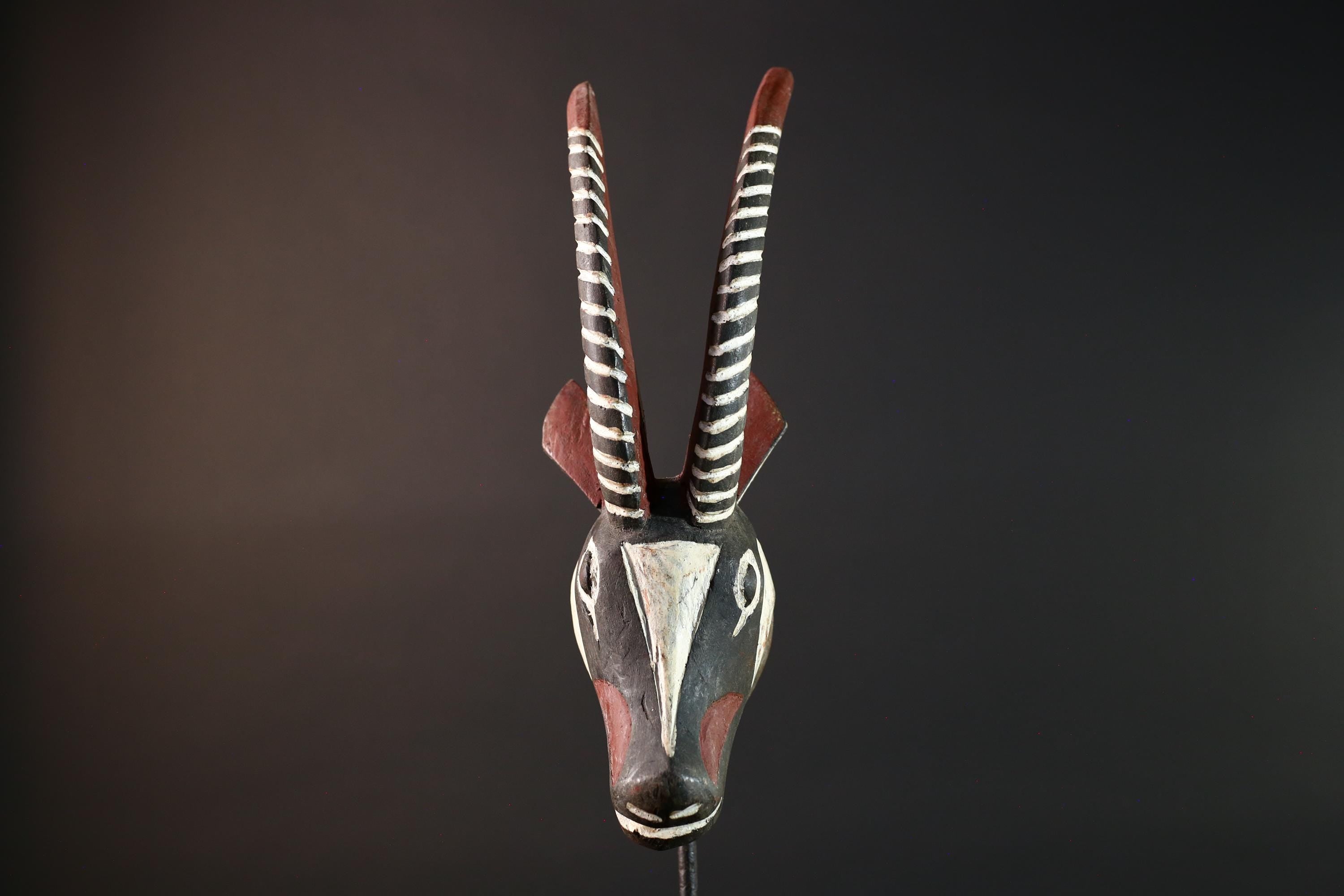 African antelope mask tribal animal head with striped horn and red black white painted wood Bobo Bamana style wall decor sculpture G5568
