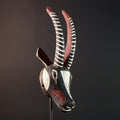 African antelope mask tribal animal head with striped horn and red black white painted wood Bobo Bamana style wall decor sculpture G5568