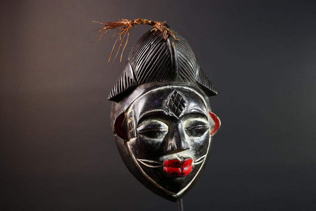 Punu tribal carving with red lips, black wood mask with fiber crest, ancestral spirit face art, African wall decor sculpture G5570