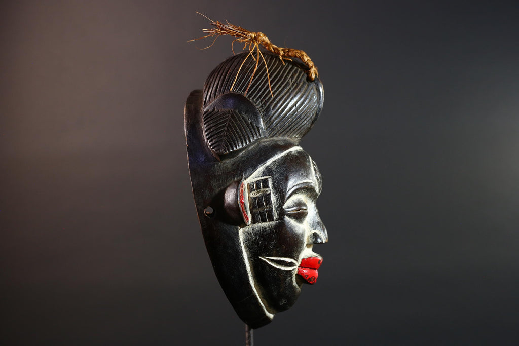 Punu tribal carving with red lips, black wood mask with fiber crest, ancestral spirit face art, African wall decor sculpture G5570