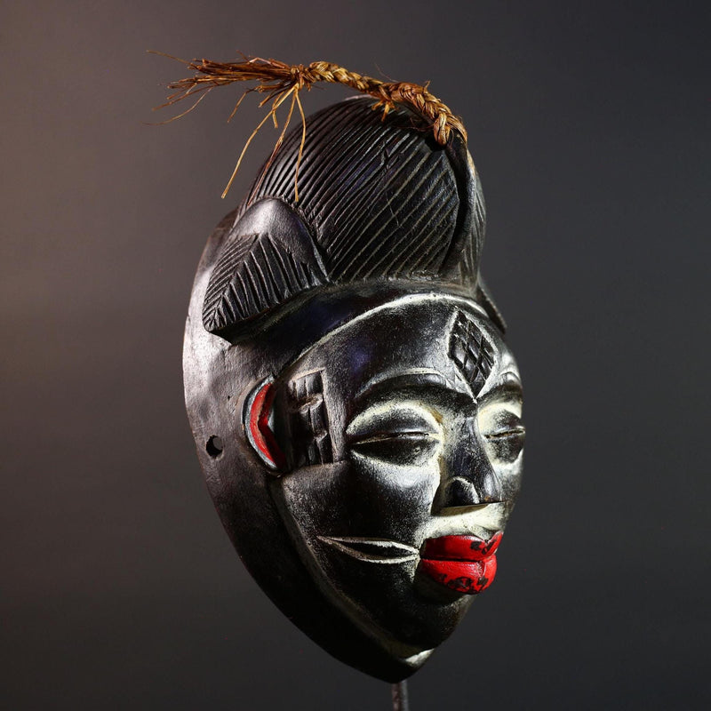 Punu tribal carving with red lips, black wood mask with fiber crest, ancestral spirit face art, African wall decor sculpture G5570