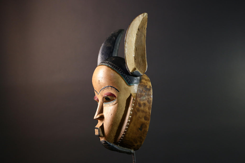 African mask Kwele tribal wall decor with curved horns carved face art collectible home accent heart shaped portrait carving G5571