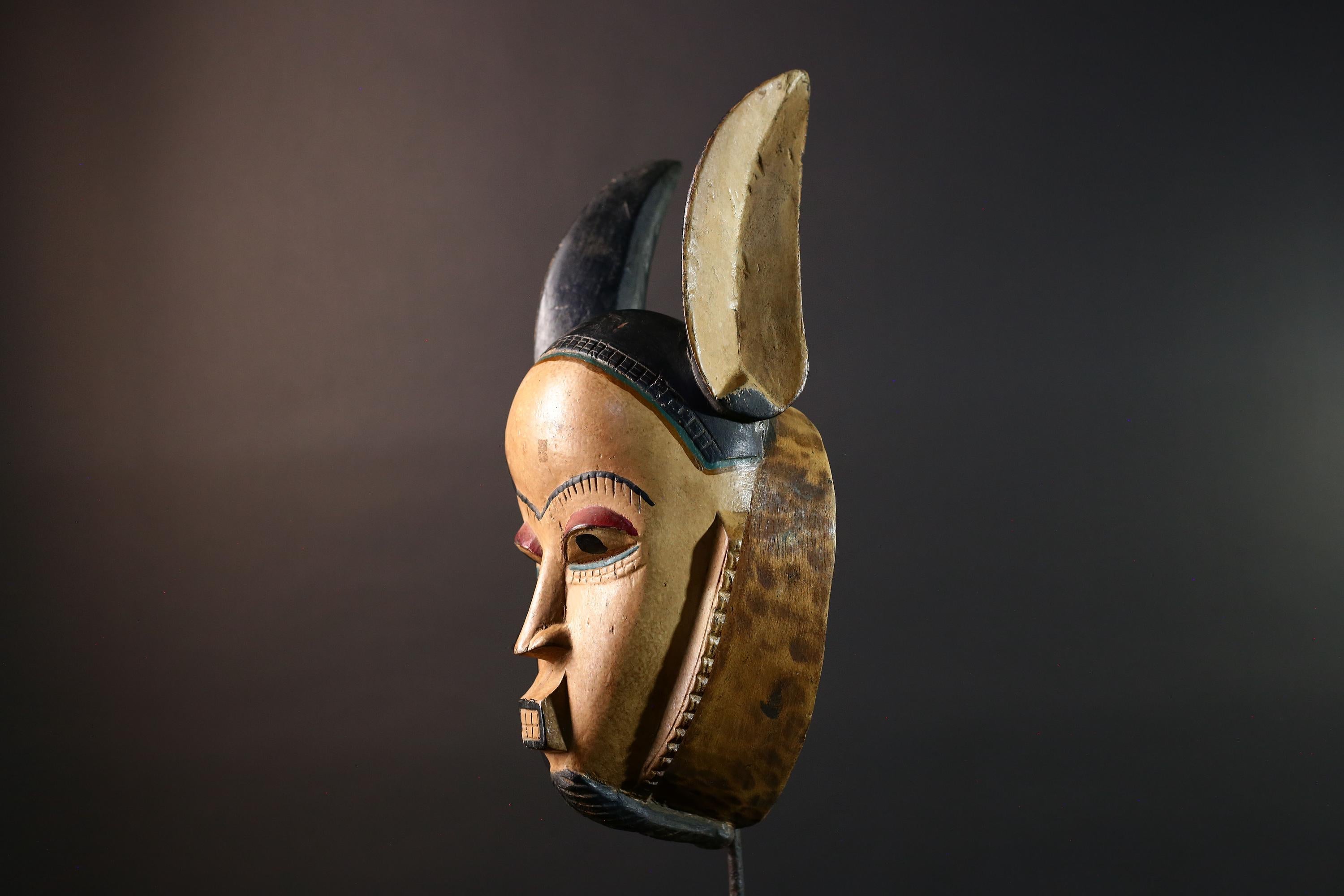 African mask Kwele tribal wall decor with curved horns carved face art collectible home accent heart shaped portrait carving G5571