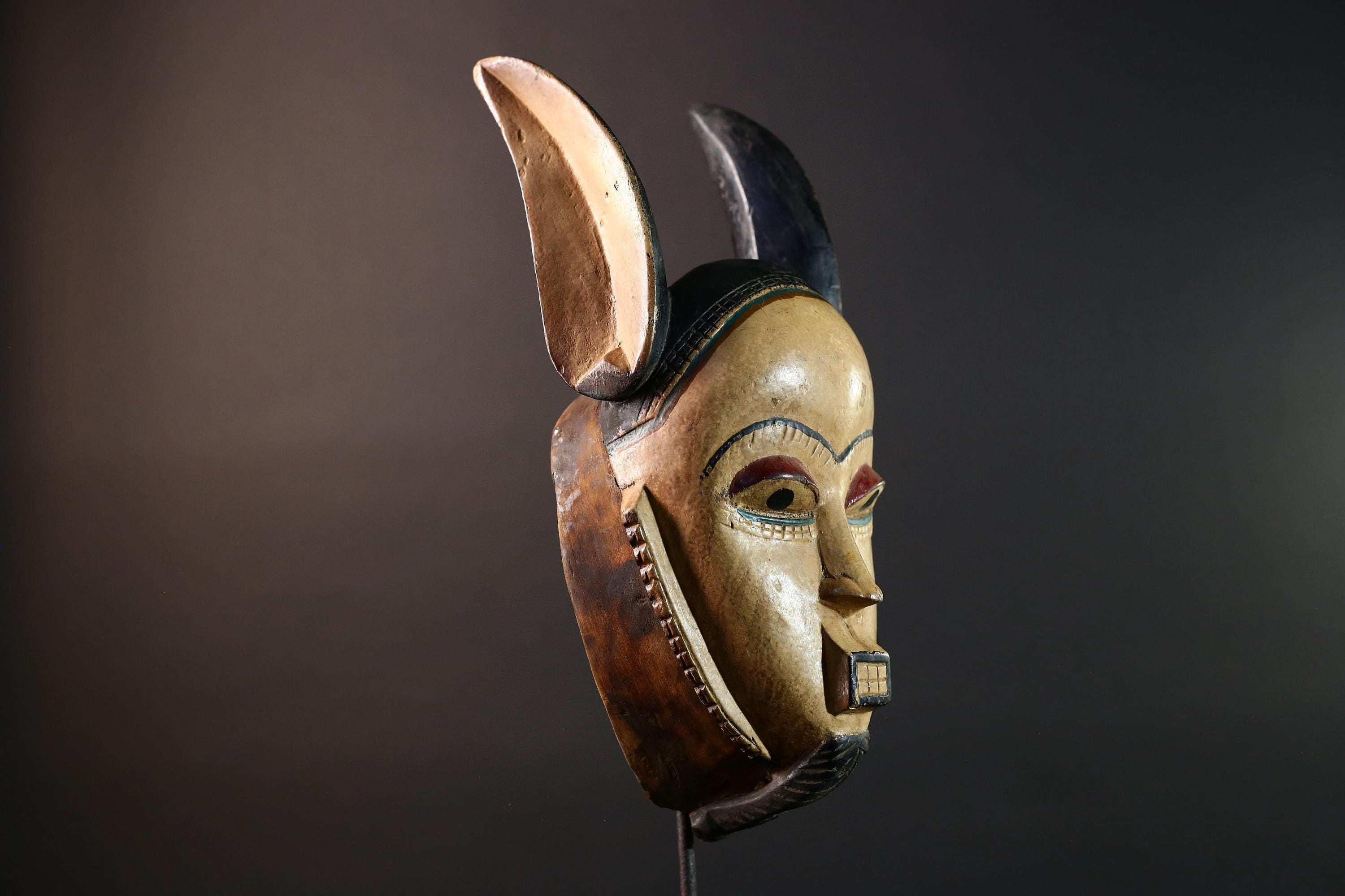 African mask Kwele tribal wall decor with curved horns carved face art collectible home accent heart shaped portrait carving G5571