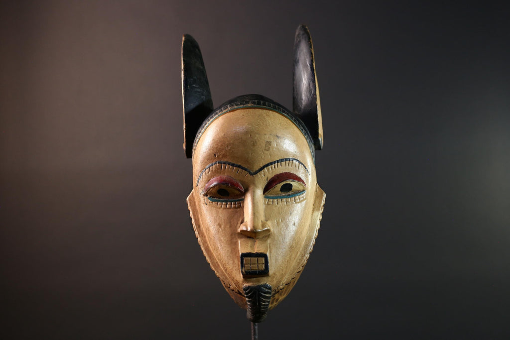 African mask Kwele tribal wall decor with curved horns carved face art collectible home accent heart shaped portrait carving G5571