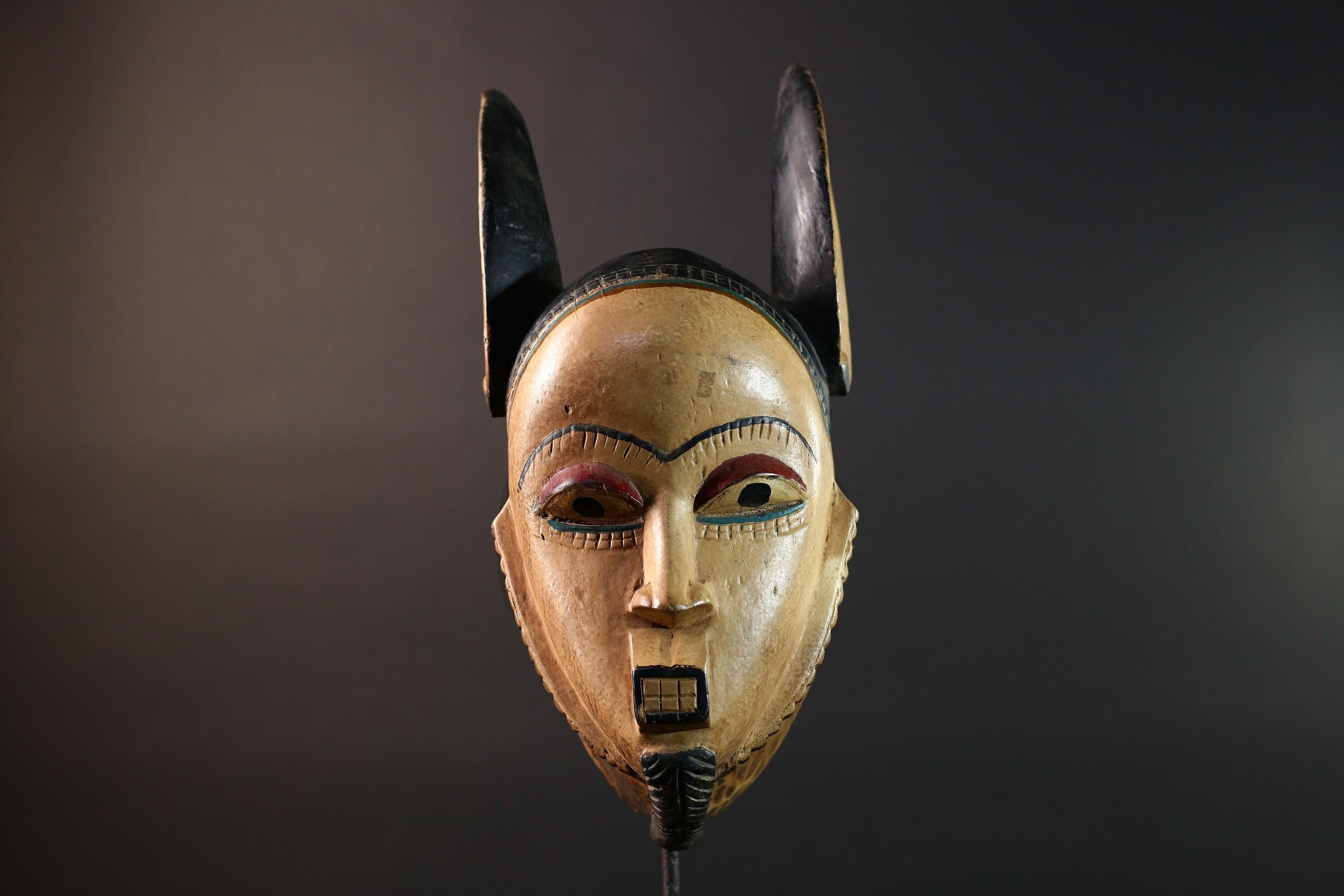 African mask Kwele tribal wall decor with curved horns carved face art collectible home accent heart shaped portrait carving G5571
