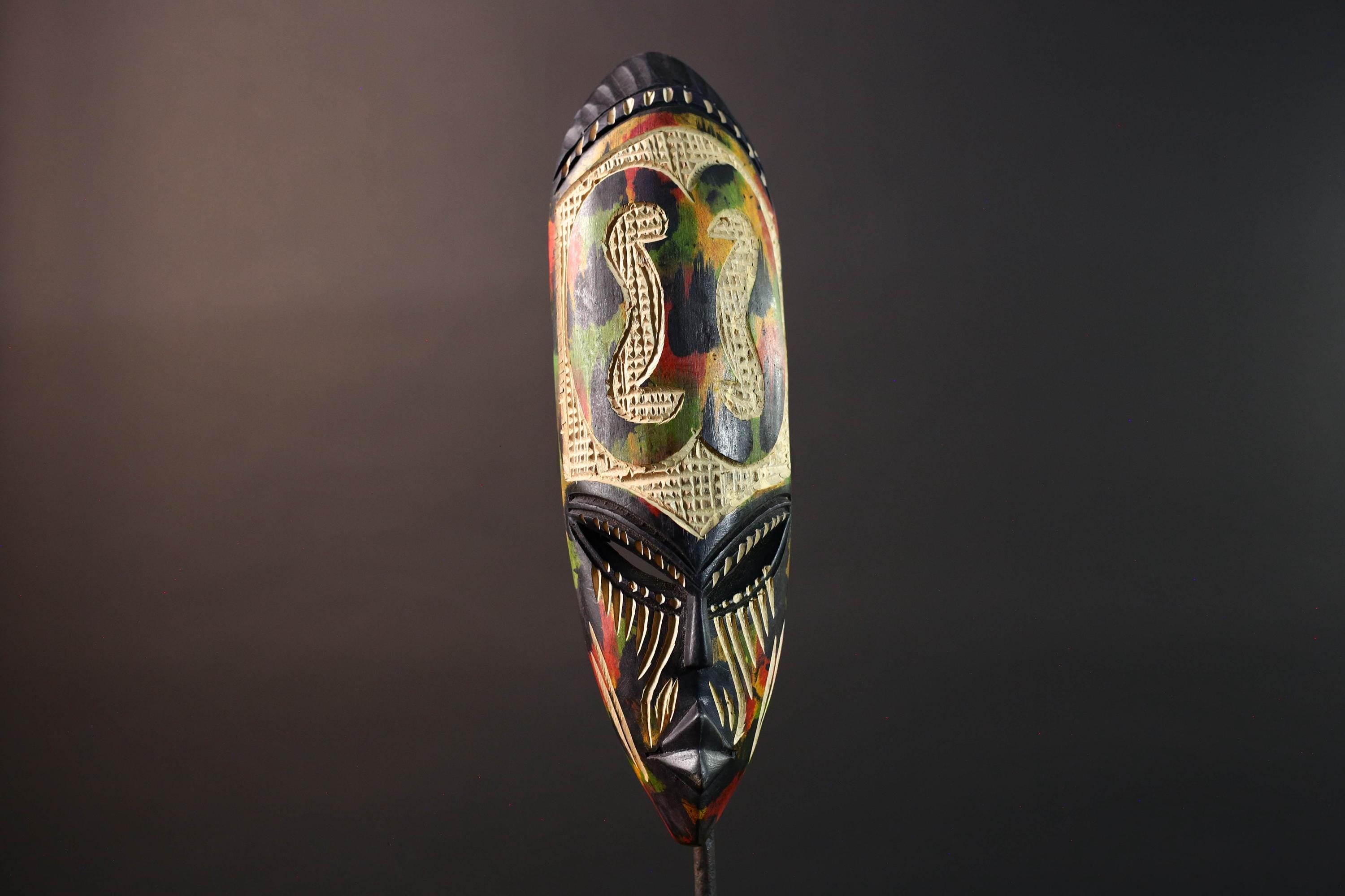 african cobra mask wall art hand carved wood tribal decor baule style snake sculpture multicolor geometric spiritual G5479
