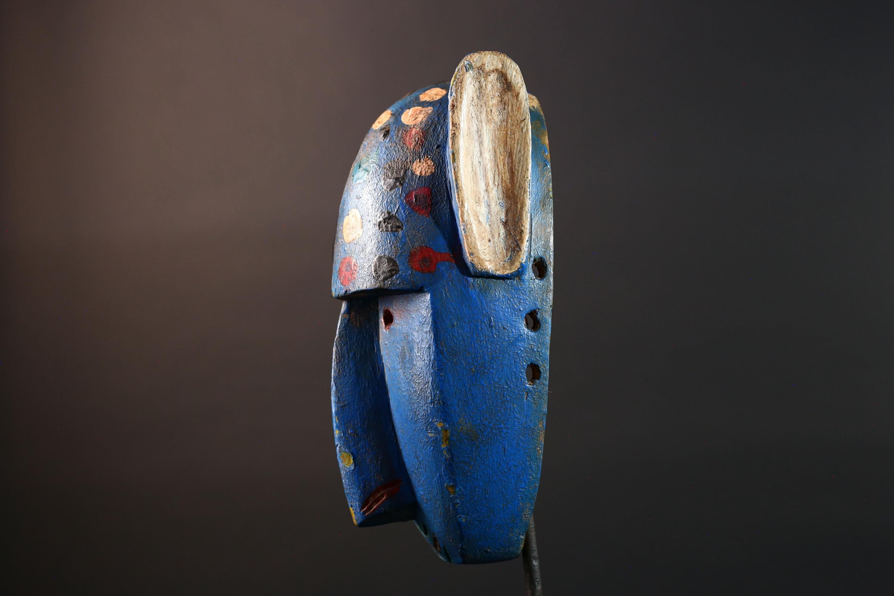 African mask Bwa spirit animal with long snout, blue painted surface, carved ears, and multicolor dotted tribal finish wall decor G5574