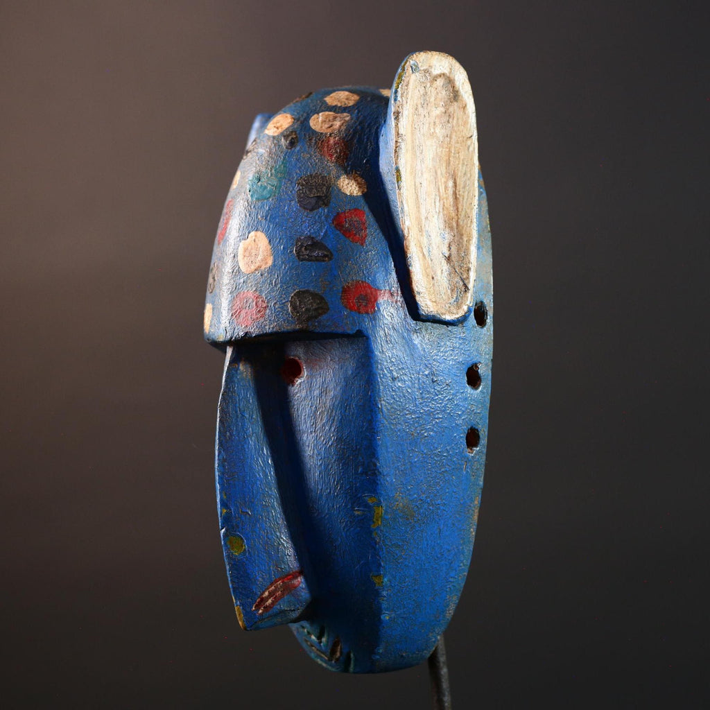 African mask Bwa spirit animal with long snout, blue painted surface, carved ears, and multicolor dotted tribal finish wall decor G5574