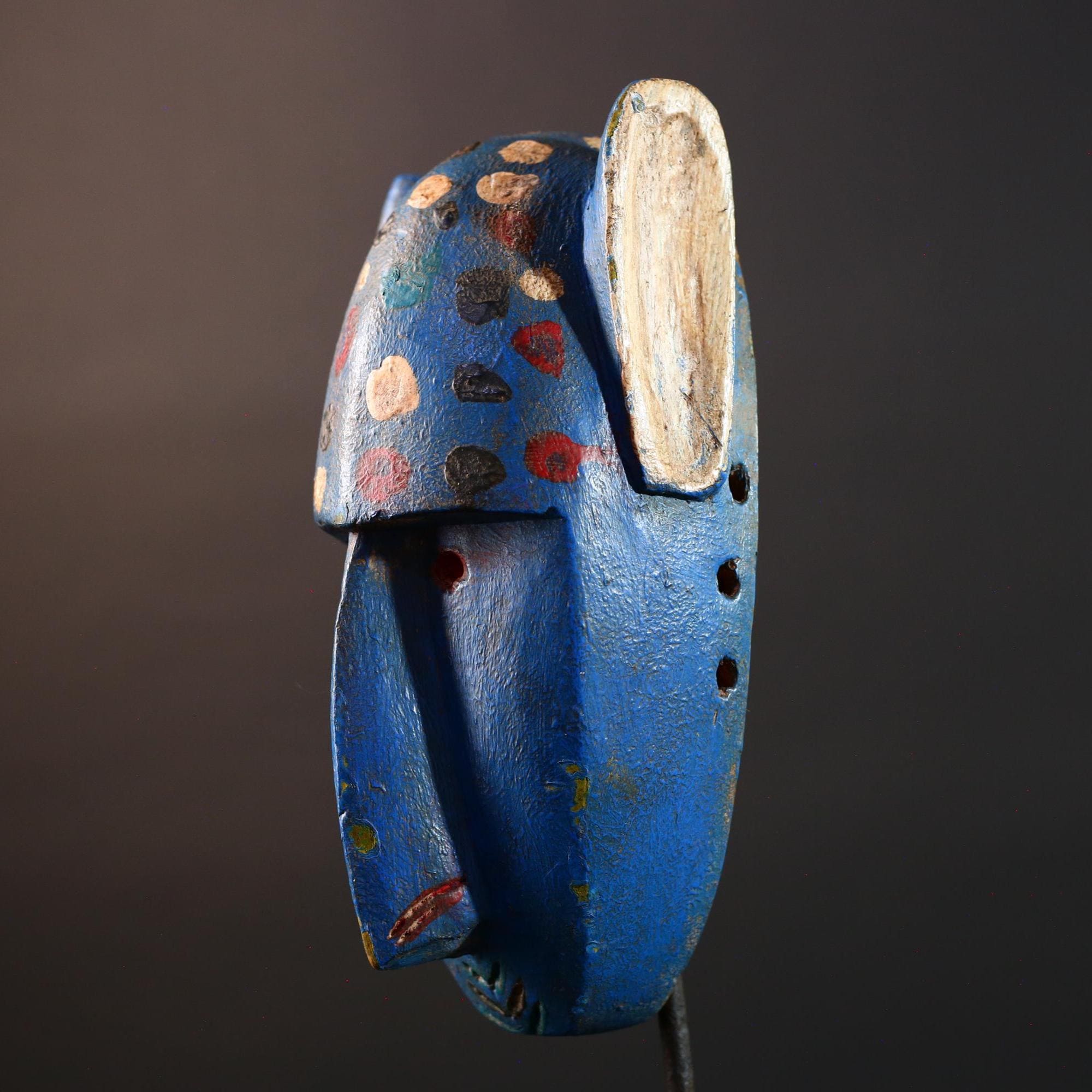 African mask Bwa spirit animal with long snout, blue painted surface, carved ears, and multicolor dotted tribal finish wall decor G5574