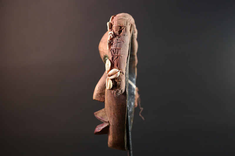 African mask Dan cowrie headdress with green eyelids, red lips, and carved wood female spirit face from Côte d’Ivoire wall art G5575
