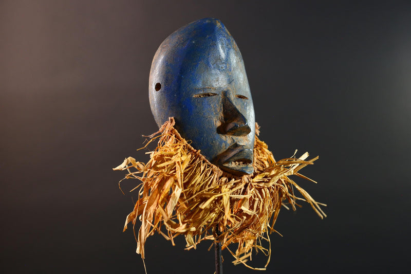 African mask Dan blue face with raffia fringe, slitted eyes, tribal carving from Côte d’Ivoire for ceremonial wall art or decor G5576