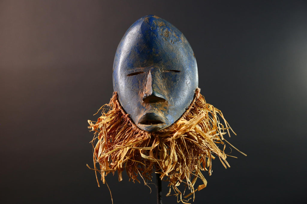 African mask Dan blue face with raffia fringe, slitted eyes, tribal carving from Côte d’Ivoire for ceremonial wall art or decor G5576
