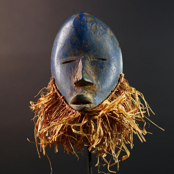 African mask Dan blue face with raffia fringe, slitted eyes, tribal carving from Côte d’Ivoire for ceremonial wall art or decor G5576