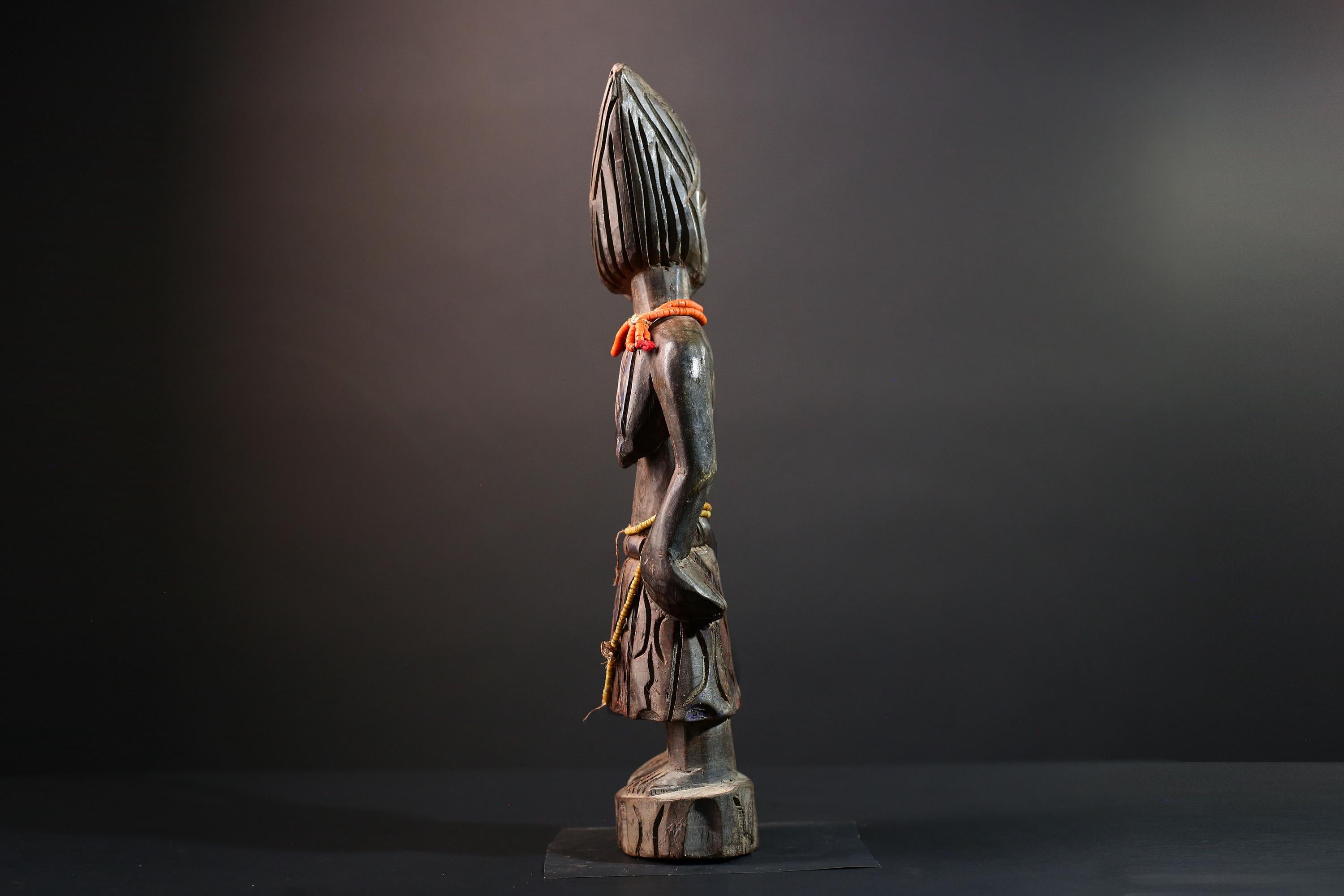 African statue Yoruba carved female figure from Nigeria with beads, tribal details, and dark finish for spiritual home decor G5561