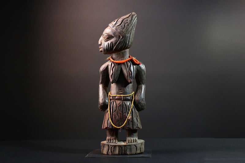 African statue Yoruba carved female figure from Nigeria with beads, tribal details, and dark finish for spiritual home decor G5561