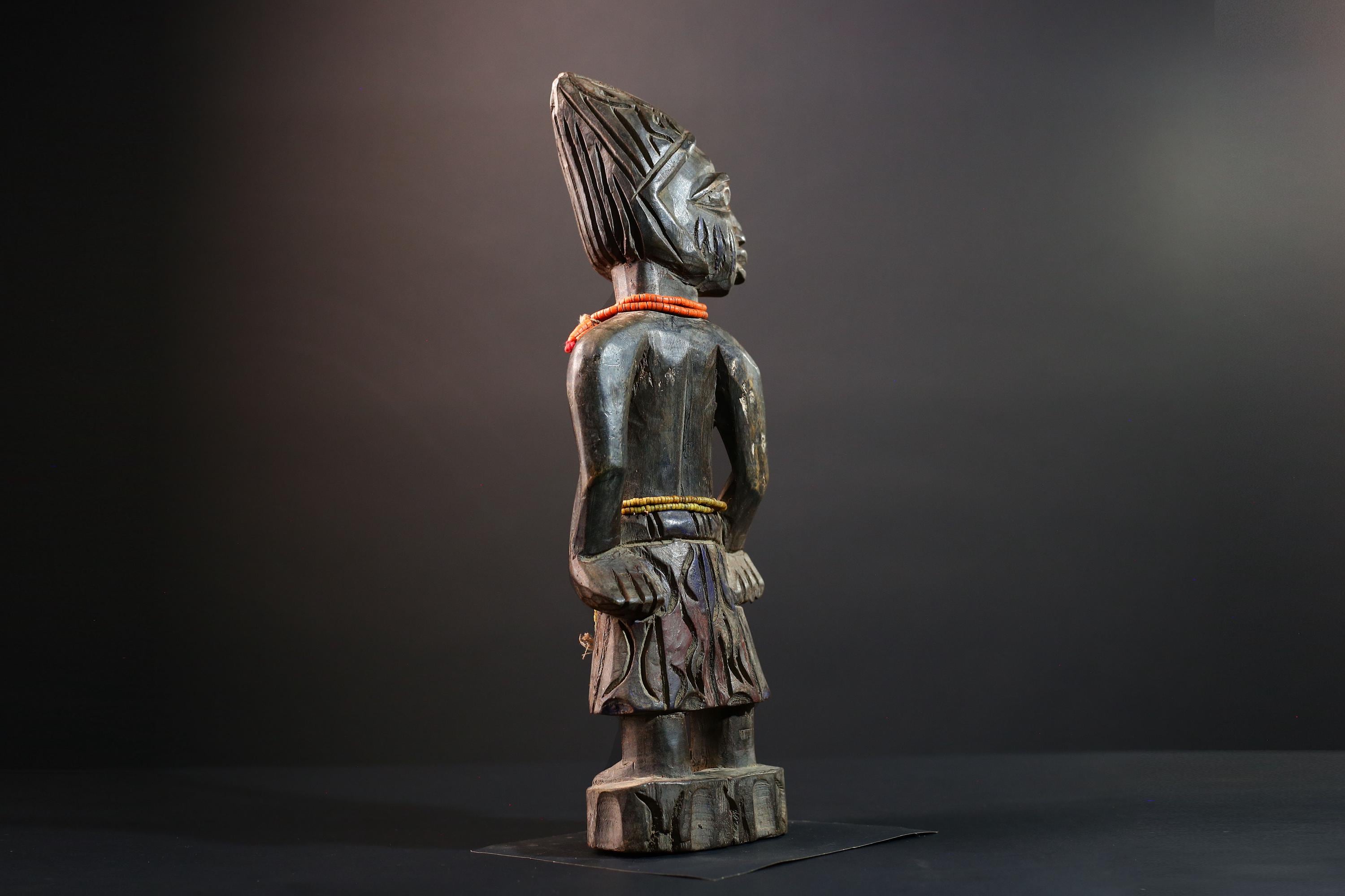 African statue Yoruba carved female figure from Nigeria with beads, tribal details, and dark finish for spiritual home decor G5561