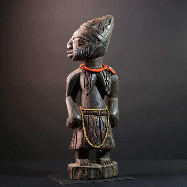 African statue Yoruba carved female figure from Nigeria with beads, tribal details, and dark finish for spiritual home decor G5561