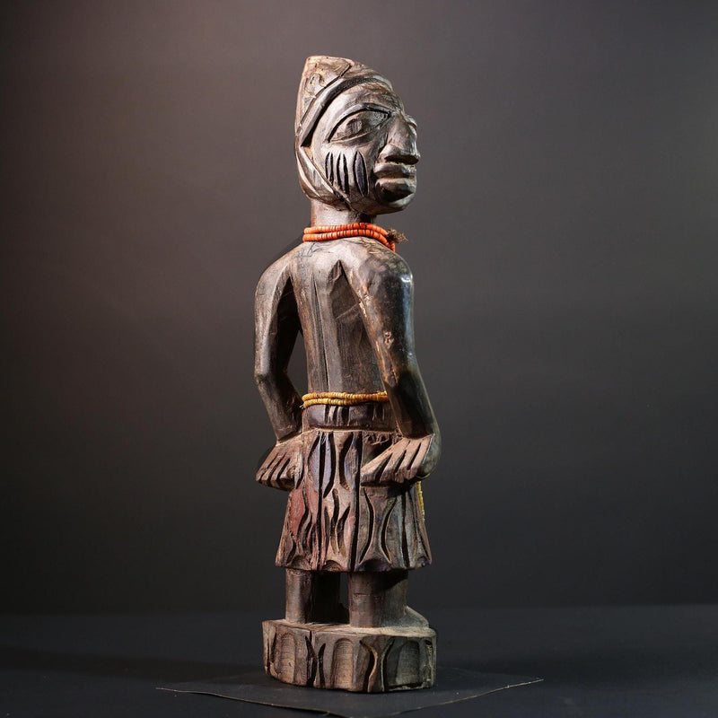 African statue Yoruba carved female figure from Nigeria with beads, tribal details, and dark finish for spiritual home decor G5561
