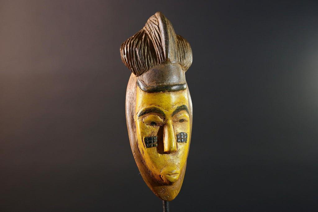 African mask Baule yellow wall sculpture tribal face carving cultural artifact leaf crest decor artisan African wood art piece G5565