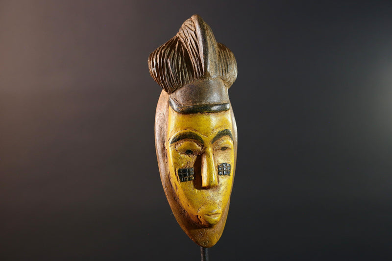 African mask Baule yellow wall sculpture tribal face carving cultural artifact leaf crest decor artisan African wood art piece G5565
