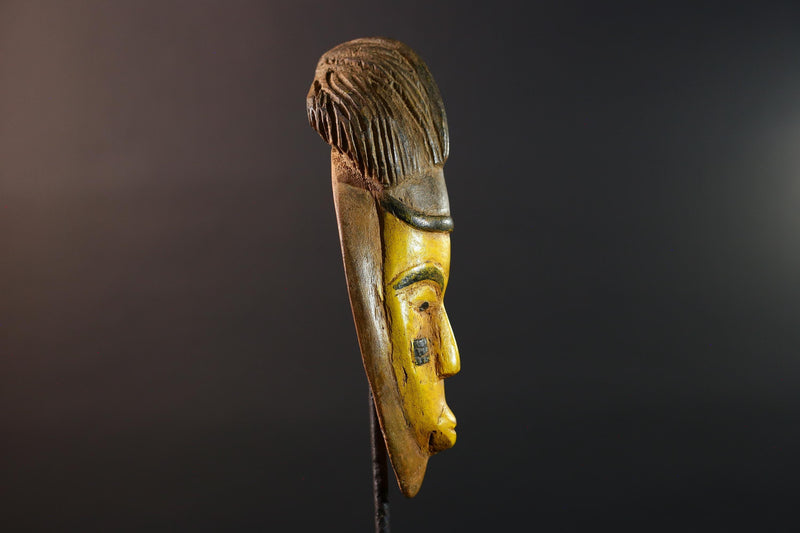 African mask Baule yellow wall sculpture tribal face carving cultural artifact leaf crest decor artisan African wood art piece G5565