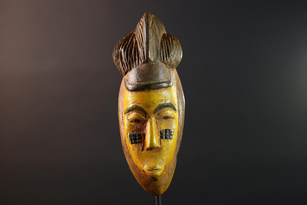 African mask Baule yellow wall sculpture tribal face carving cultural artifact leaf crest decor artisan African wood art piece G5565