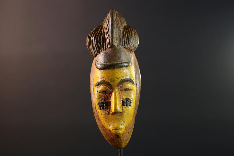 African mask Baule yellow wall sculpture tribal face carving cultural artifact leaf crest decor artisan African wood art piece G5565