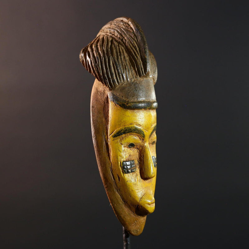 African mask Baule yellow wall sculpture tribal face carving cultural artifact leaf crest decor artisan African wood art piece G5565