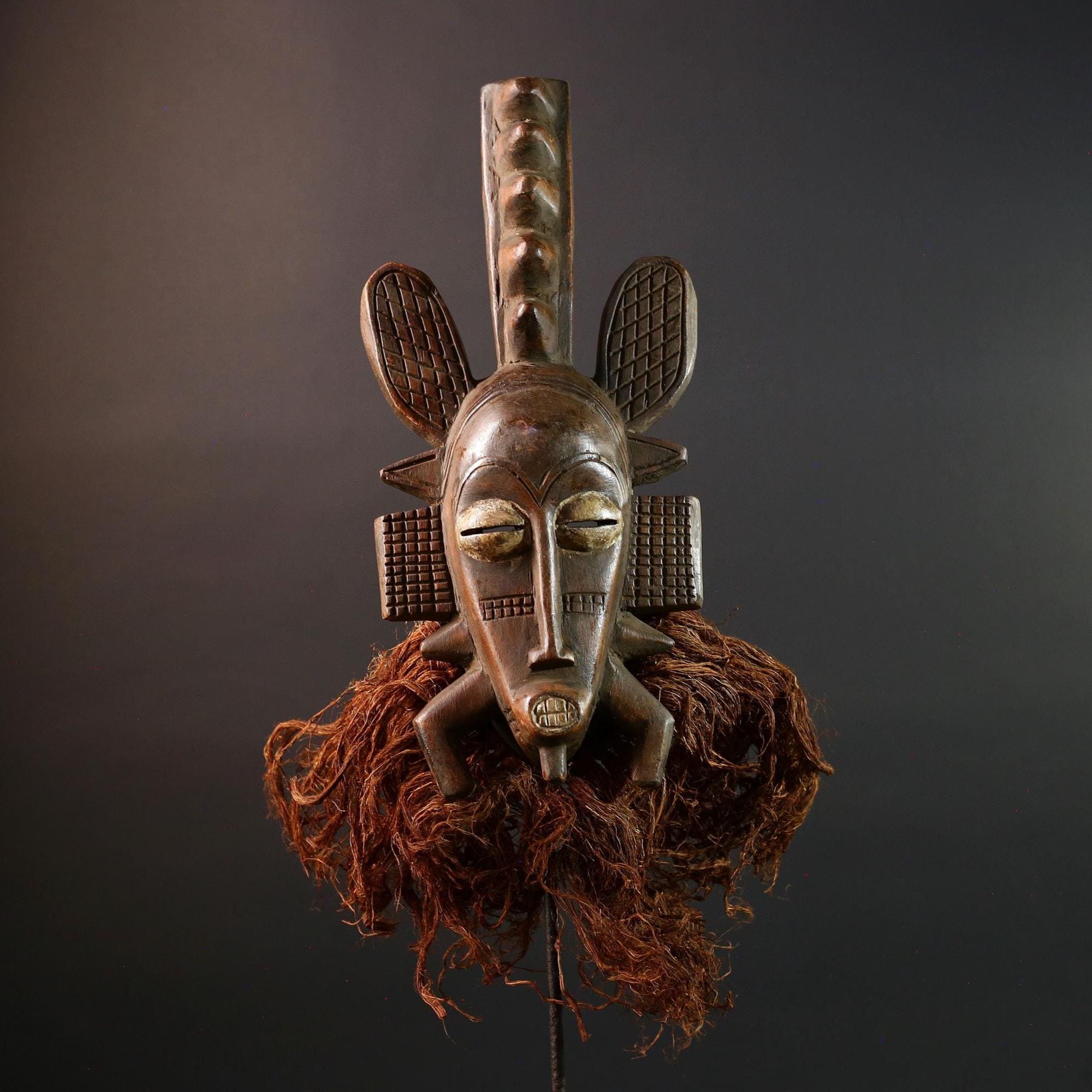 African mask Senufo tribal warrior face carving with raffia beard tall crest art cultural wall decor bold ceremonial mask sculpture G5578