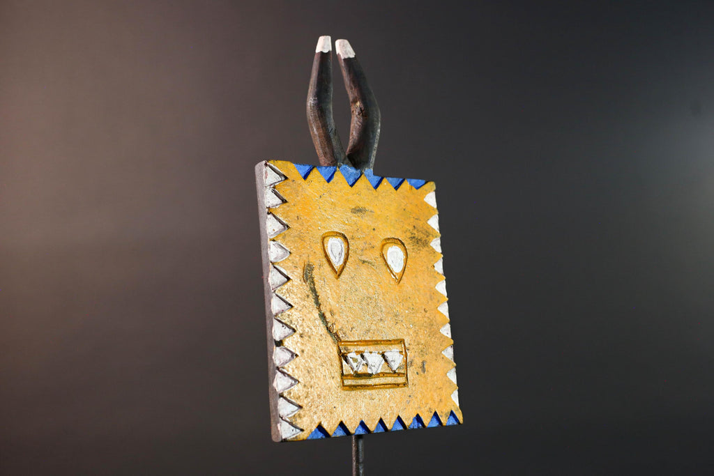 African wall decor Bwa tribal sun mask yellow geometric face with blue white painted motifs and pronged crest cultural home display G5496