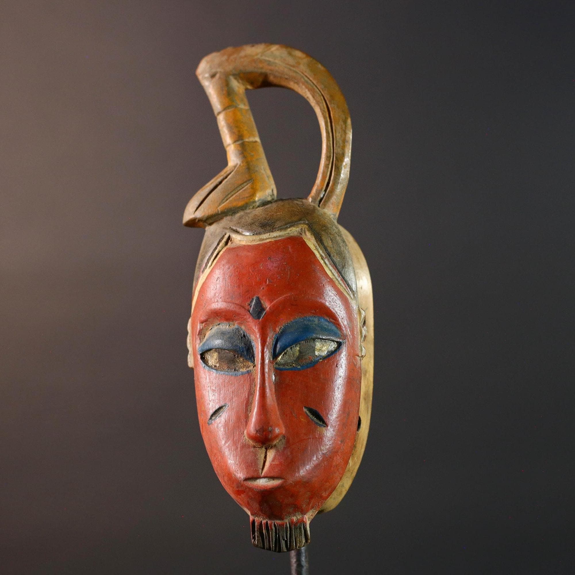 African Guro wall mask red face carved wood mask with loop crest tribal sculpture rustic African decor handmade wall hanging G5505
