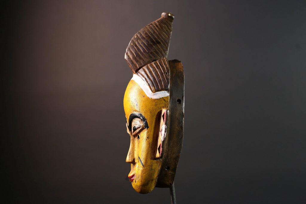 Yellow African tribal mask hand carved wood wall sculpture with cowrie shells leather crest folk figure symbolic ethnic home decor-G5522