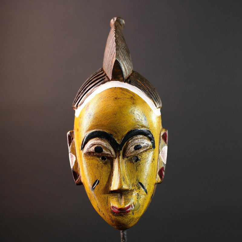 Yellow African tribal mask hand carved wood wall sculpture with cowrie shells leather crest folk figure symbolic ethnic home decor-G5522