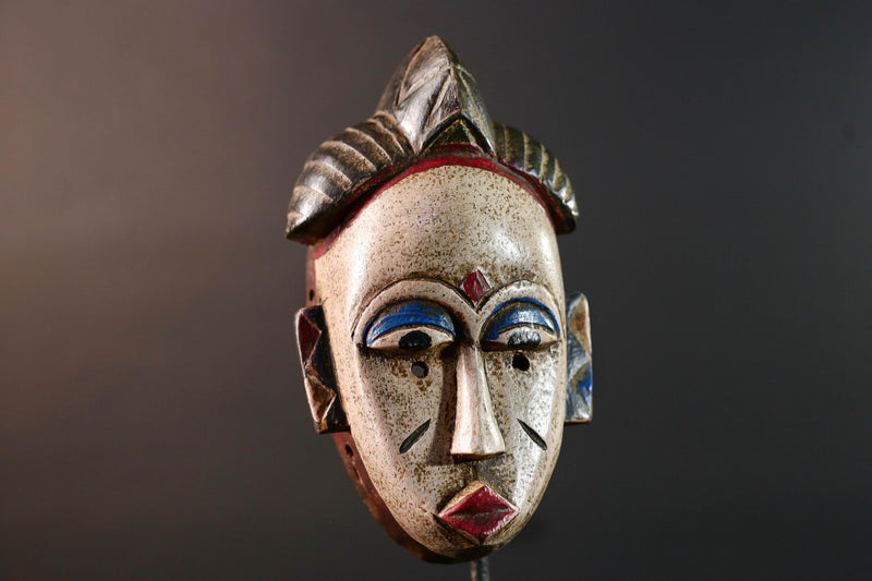 African tribal mask Baule carved wood wall decor with scarification red lips blue brows ivory tone artisan spiritual face sculpture-G5520