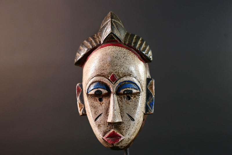 African tribal mask Baule carved wood wall decor with scarification red lips blue brows ivory tone artisan spiritual face sculpture-G5520