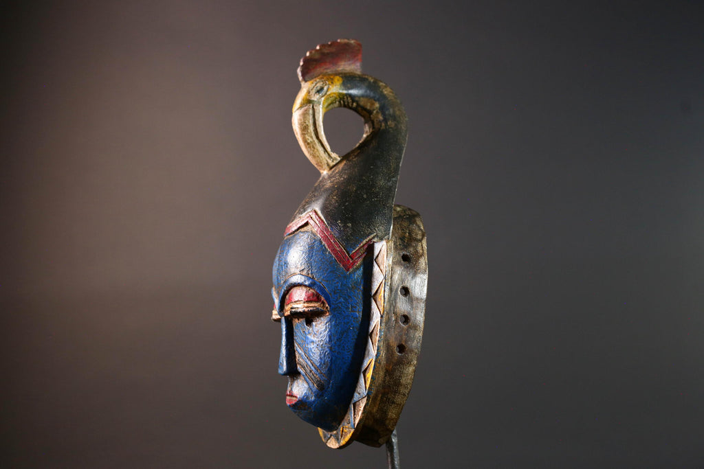 African tribal mask Guro carved wood wall decor with blue face bird crest scarification red white eyelids artisan symbolic sculpture-G5517