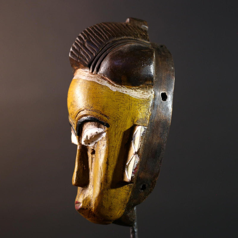 African mask Baule tribe yellow face carved wall decor with ridged hairstyle and white almond eyes tribal wood home accent sculpture-G5544
