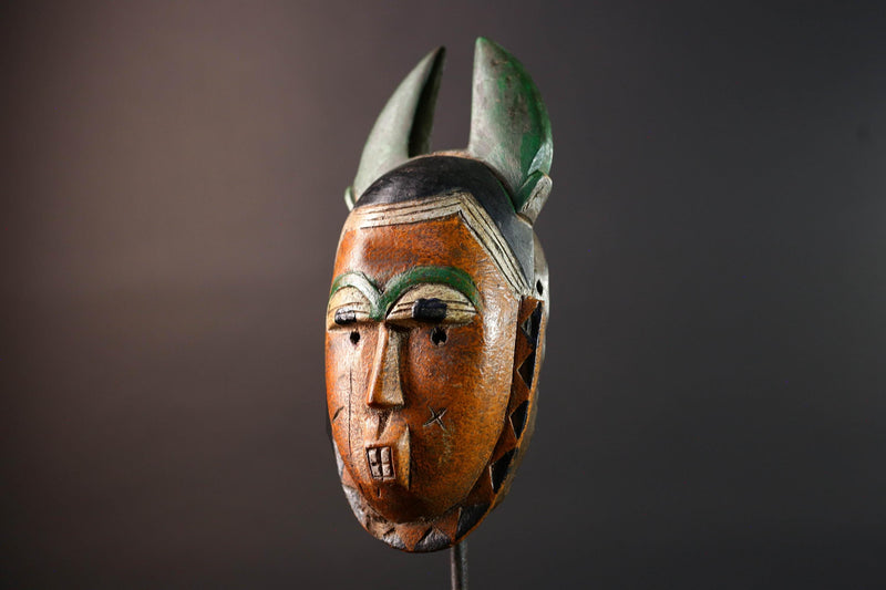 African mask Guro tribe orange face wall sculpture with green horn crest carved tribal cheek marks ethnic wood home art decor-G5542