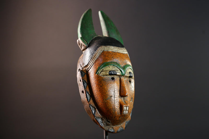 African mask Guro tribe orange face wall sculpture with green horn crest carved tribal cheek marks ethnic wood home art decor-G5542