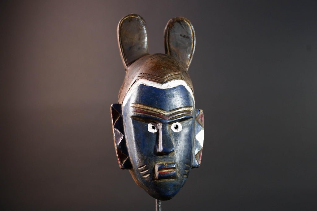 African mask Guro tribe blue face carved wood with white eyes animal crest and geometric ear panels tribal wall decor home art-G5541