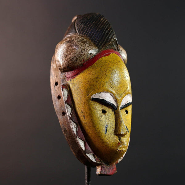 African mask Baule tribe yellow face carved wood with almond eyes rounded side buns geometric cheeks and central crest wall decor-G5539