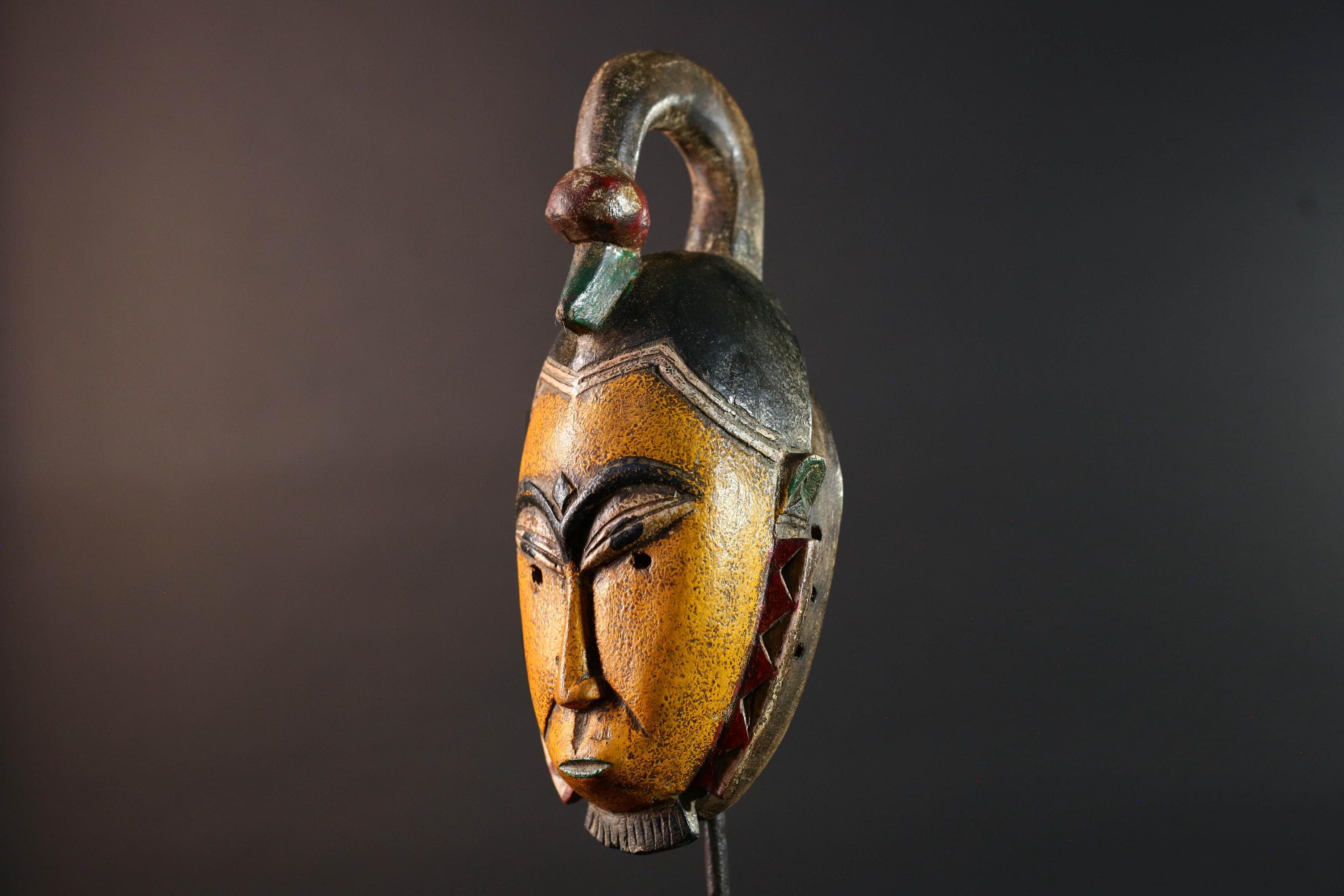 African mask Guro carving yellow face with animal crest red white triangle trim tribal wall decor wood sculpture spiritual art-G5548