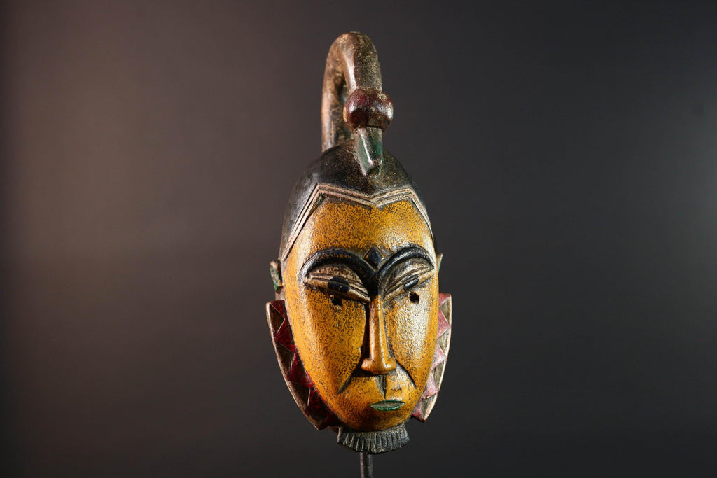 African mask Guro carving yellow face with animal crest red white triangle trim tribal wall decor wood sculpture spiritual art-G5548