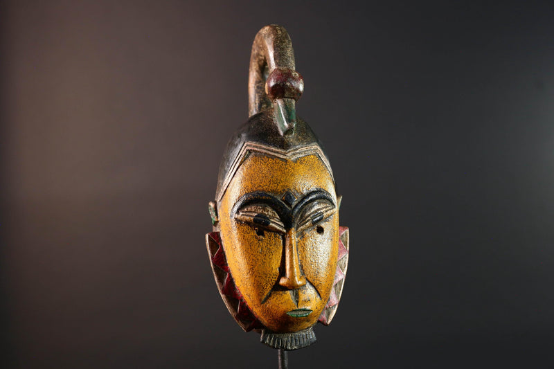 African mask Guro carving yellow face with animal crest red white triangle trim tribal wall decor wood sculpture spiritual art-G5548