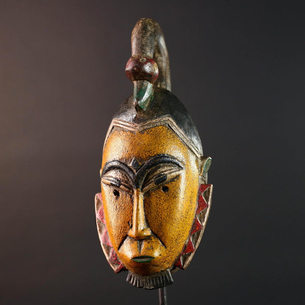 African mask Guro carving yellow face with animal crest red white triangle trim tribal wall decor wood sculpture spiritual art-G5548
