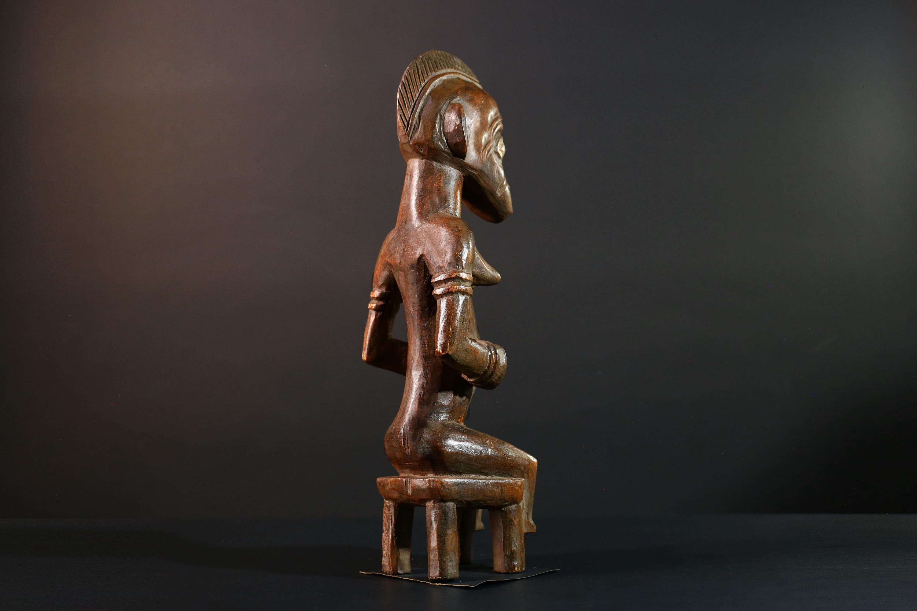 African Yoruba female figure seated on stool carved tribal fertility sculpture from Nigeria altar decor spiritual wood art-G5640