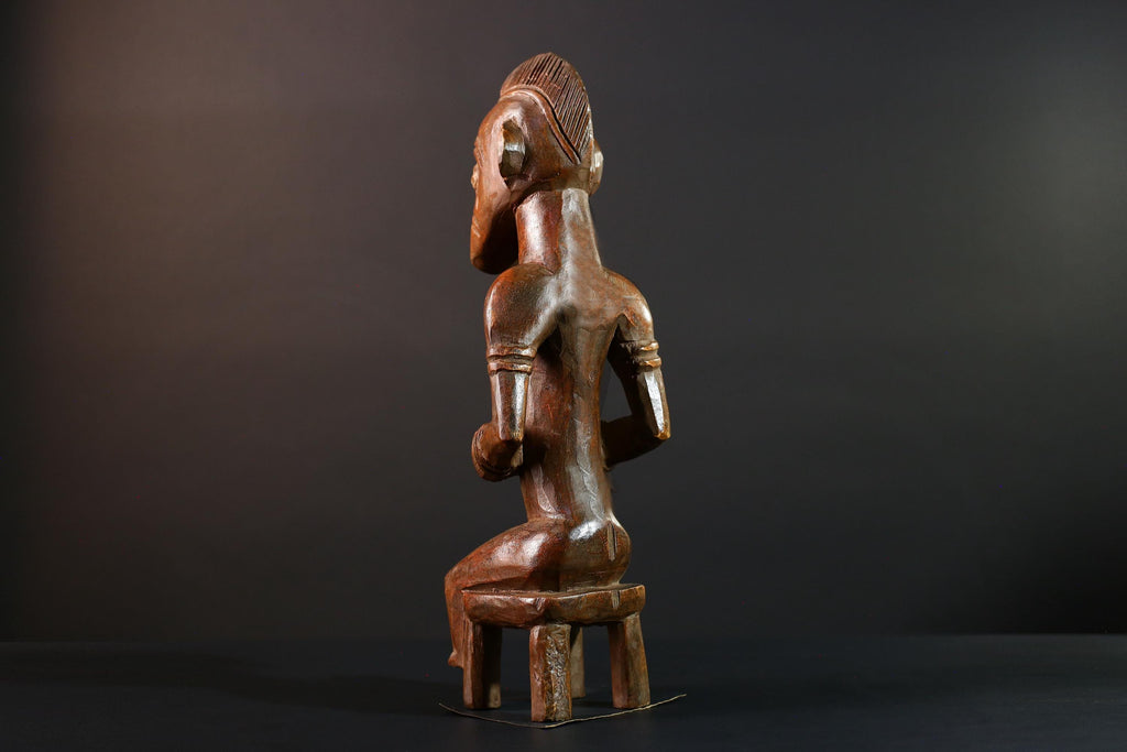 African Yoruba female figure seated on stool carved tribal fertility sculpture from Nigeria altar decor spiritual wood art-G5640