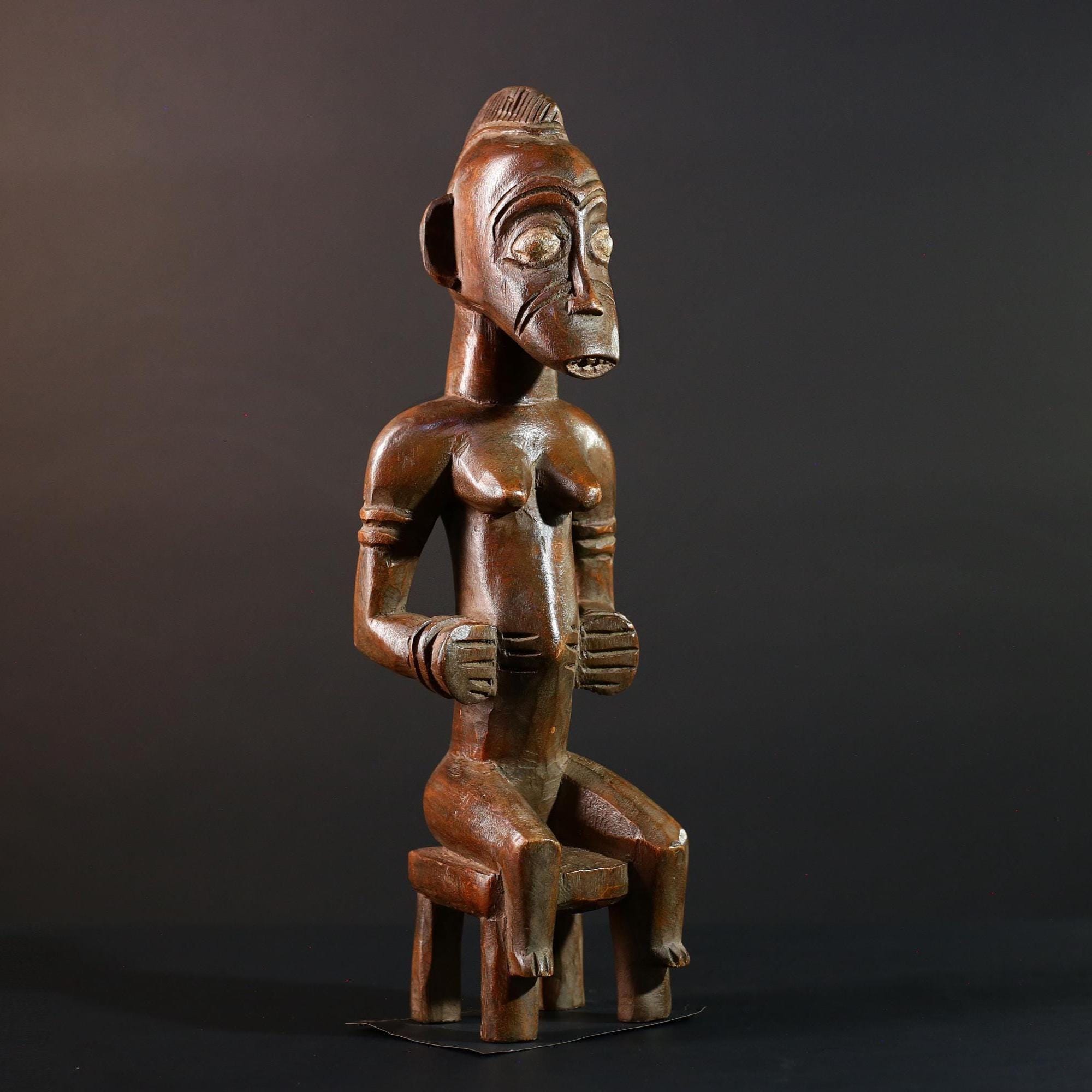 African Yoruba female figure seated on stool carved tribal fertility sculpture from Nigeria altar decor spiritual wood art-G5640
