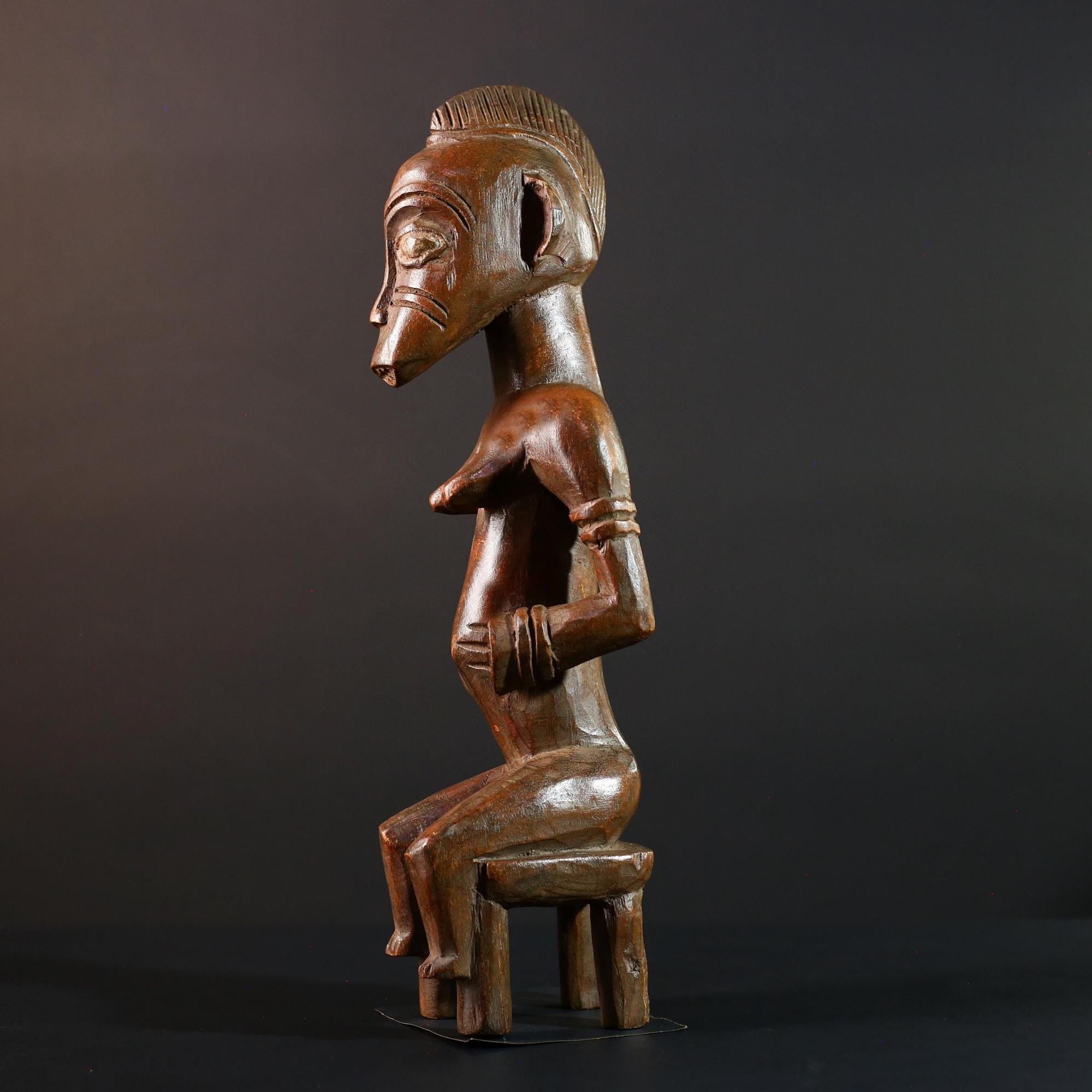 African Yoruba female figure seated on stool carved tribal fertility sculpture from Nigeria altar decor spiritual wood art-G5640